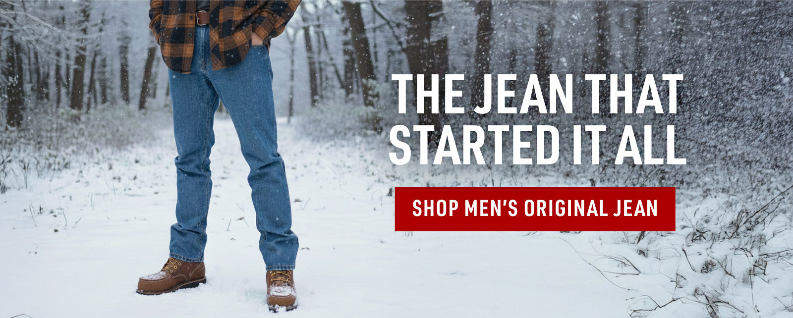 Person wearing blue jeans and brown plaid shirt in snowy forest with promotional text overlay.